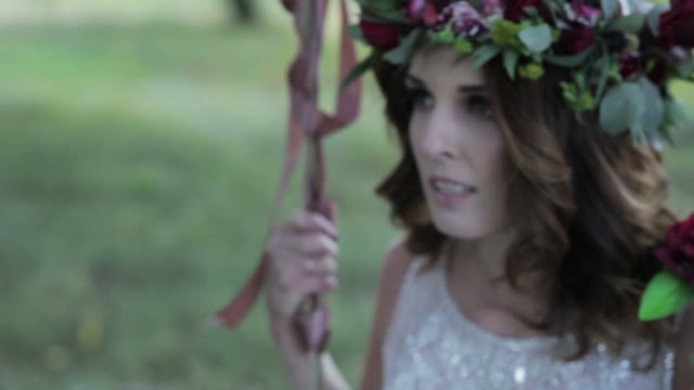 Bride Swinging On A Swing Close-up