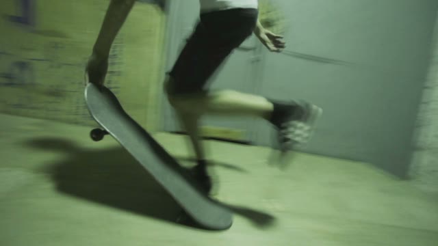 Man Makes A Trick On A Skateboard