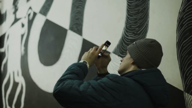 Man Photographing On Phone