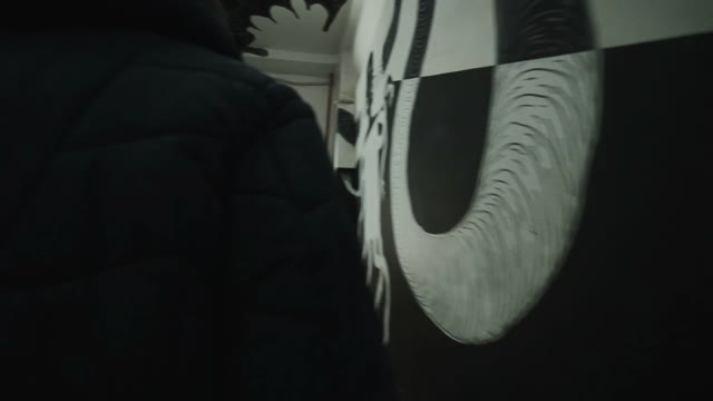 Man Rises Ornamented Entrance