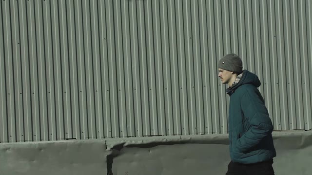 Man Walks Through The City