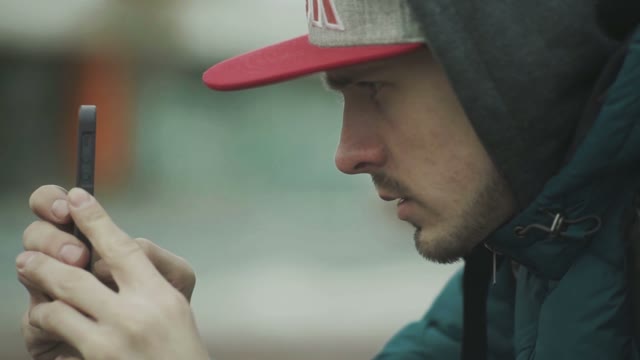 Man Photographs On The Phone