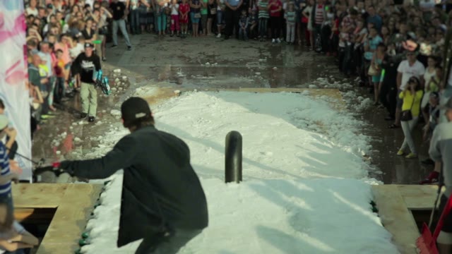 Snowboarder Glides Through The Pipe