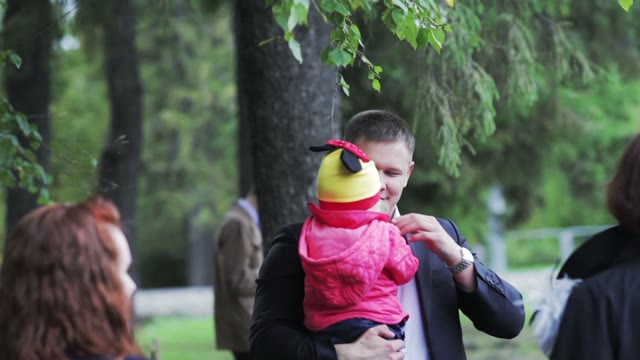 Father Playing Wiht His Child In A Forest