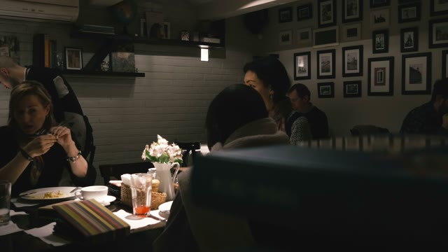 People Dine In The Restaurant