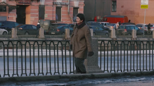 Smiling Woman Walking In The City