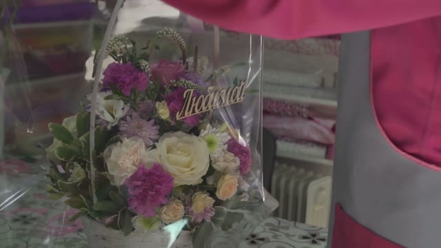 Florist Preparing Bouquet In Gift Shop