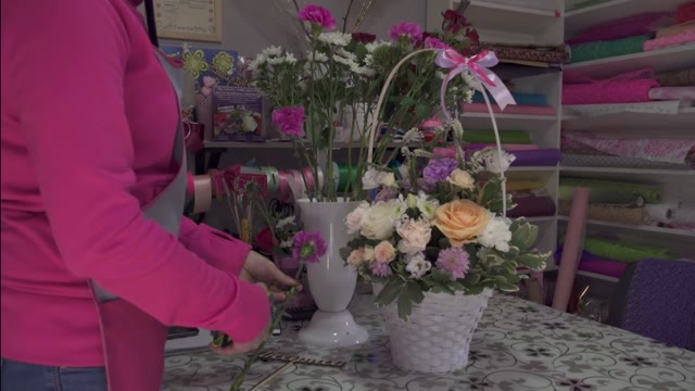 Florist Preparing Bouquet In Gift Shop