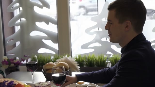 Young Couple On A Date In A Restaurant