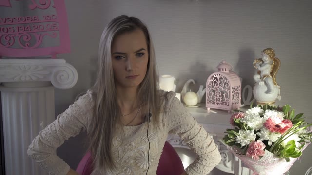Pretty Girl Gives An Interview In A Flower Shop