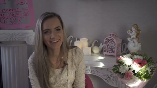 Pretty Girl Gives An Interview In A Flower Shop