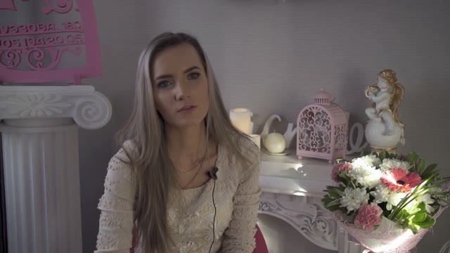Pretty Girl Gives An Interview In A Flower Shop