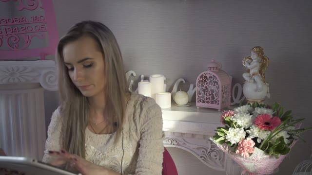 Pretty Girl Gives An Interview In A Flower Shop