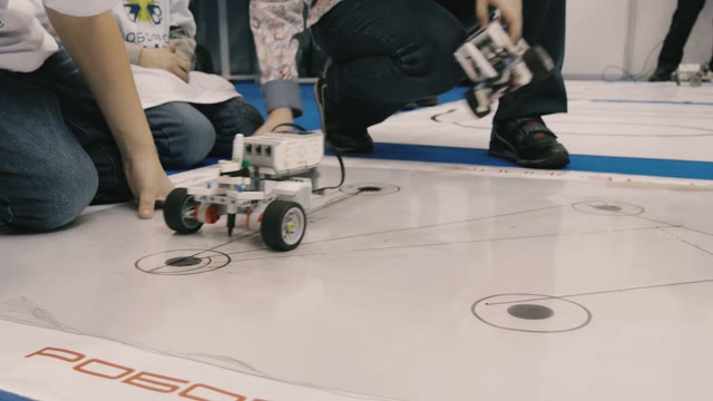 Robot On Wheels Travels Trajectory On The Floor