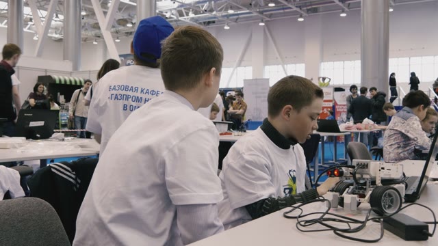 Two Boys Working On A Computer Science Fair