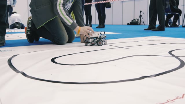 Small Robots Drive Around In A Scientific Exhibition