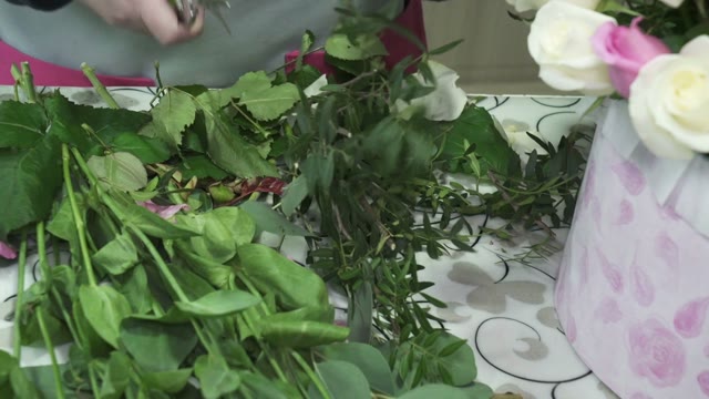 Florist Create Bouquets In Flower Shop