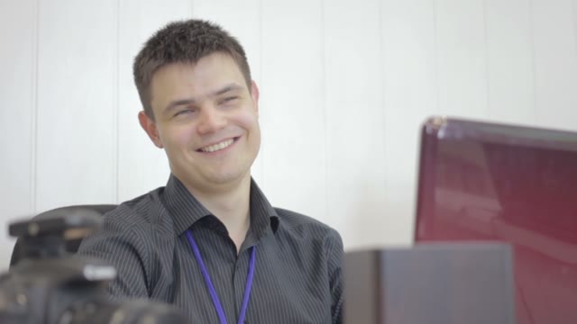 Office Worker Works On Laptop