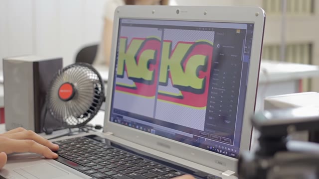 Man Working In The Graphics Editor On His Computer