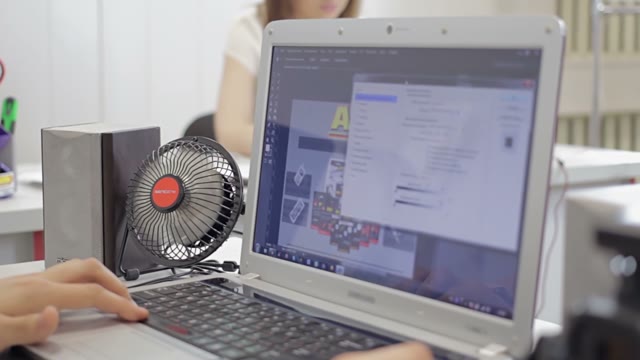 Man Working In The Graphics Editor On His Computer