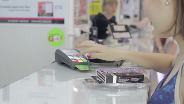 Girl Makes A Purchase At The Accessories Store