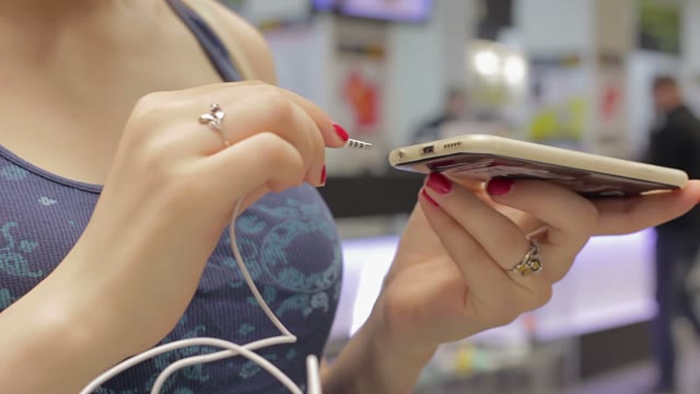 Girl Makes A Purchase At The Accessories Store