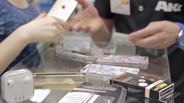 Girl Makes A Purchase At The Accessories Store