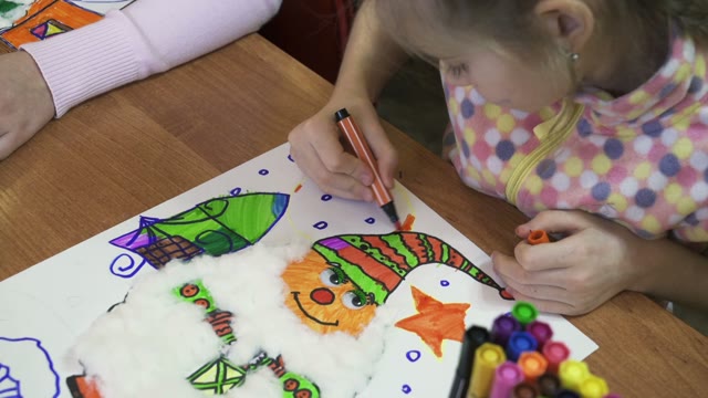 Small Children On Creative Lesson In Primary Class