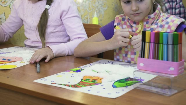 Small Children On Creative Lesson In Primary Class