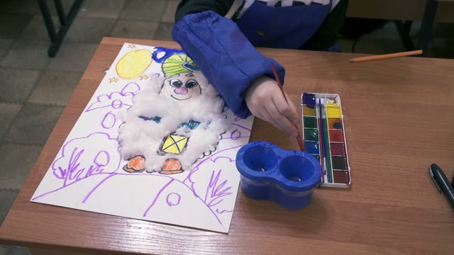 Small Children On Creative Lesson In Primary Class