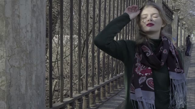 Cute Curly Girl Walking Through The Park