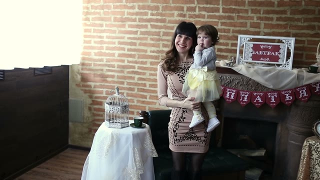People Posing To Be Photographed In The Coffee Bar Decorations