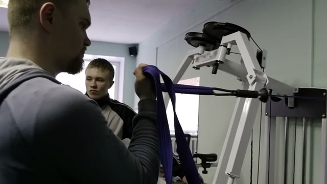 Strength Training In The Gym On Simulators