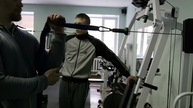 Strength Training In The Gym On Simulators