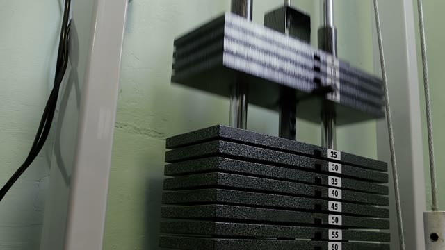Strength Training In The Gym On Simulators