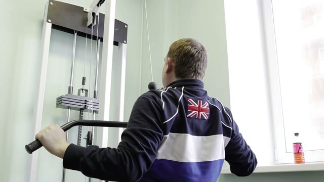Strength Training In The Gym On Simulators