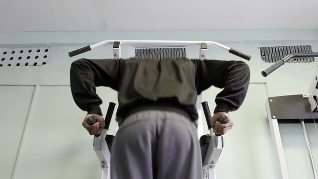Strength Training In The Gym On Simulators