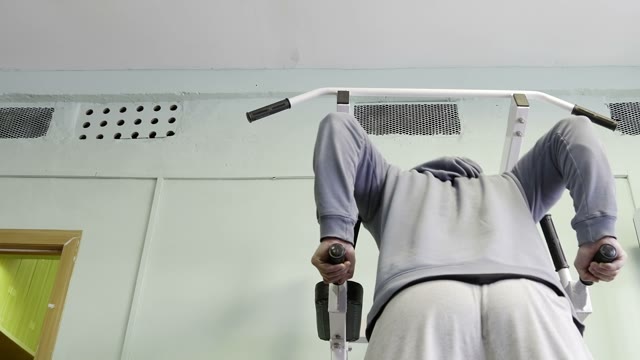 Strength Training In The Gym On Simulators