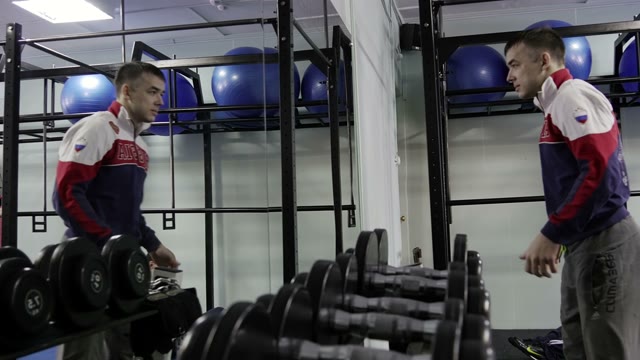 Strength Training In The Gym On Simulators