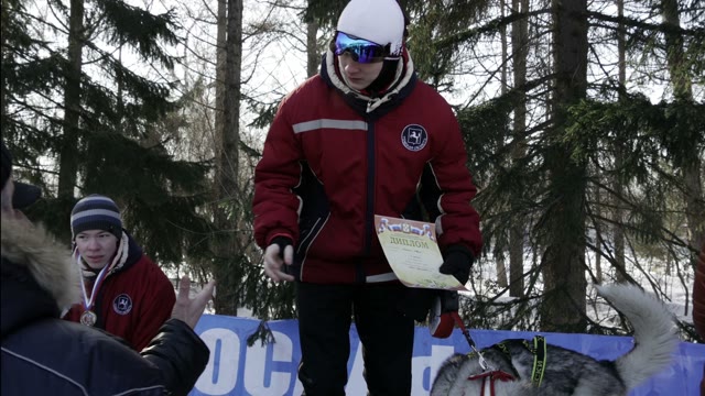 Competition In Sled Dog Racing And Skijoring