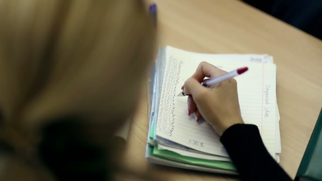 A Woman Checks The Test Results