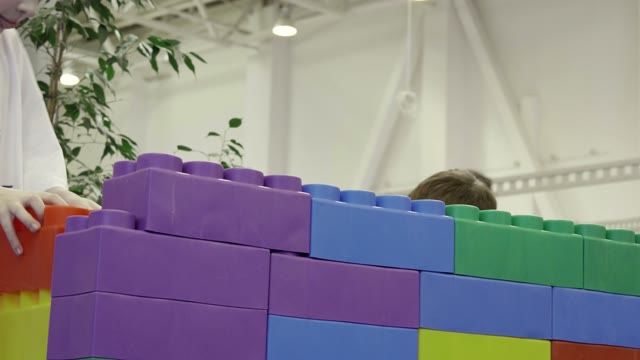 Children Making The Building Of The Large Bricks