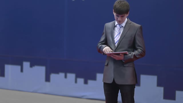 Successful Businessman Works With The Tablet