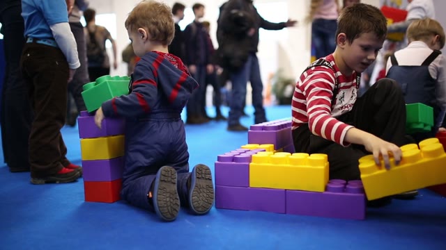Children Playing With Lego