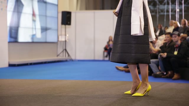 Models Walk On The Podium Close-up