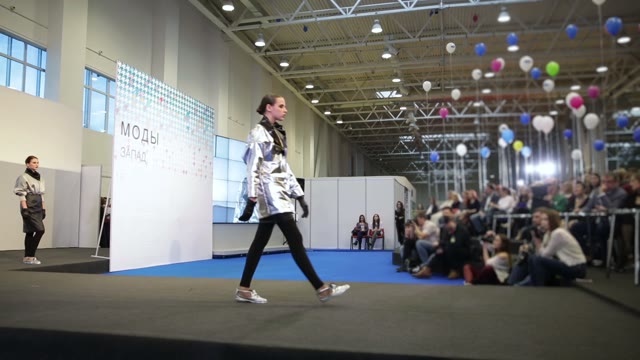 Model Walks Along The Catwalk