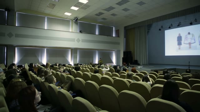Spectators Watch The Presentation