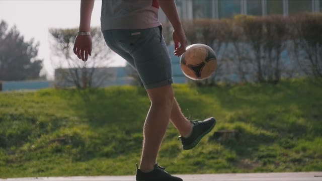 Man Playing With A Ball On The Nature