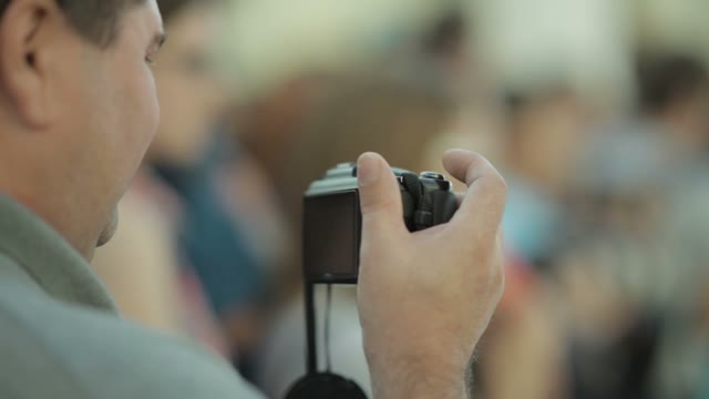 A Man With A Camera Removes The Competition