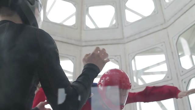 Man With An Instructor In A Wind Tunnel
